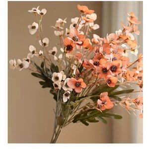 Elegant Floral Arrangement in Orange and Cream